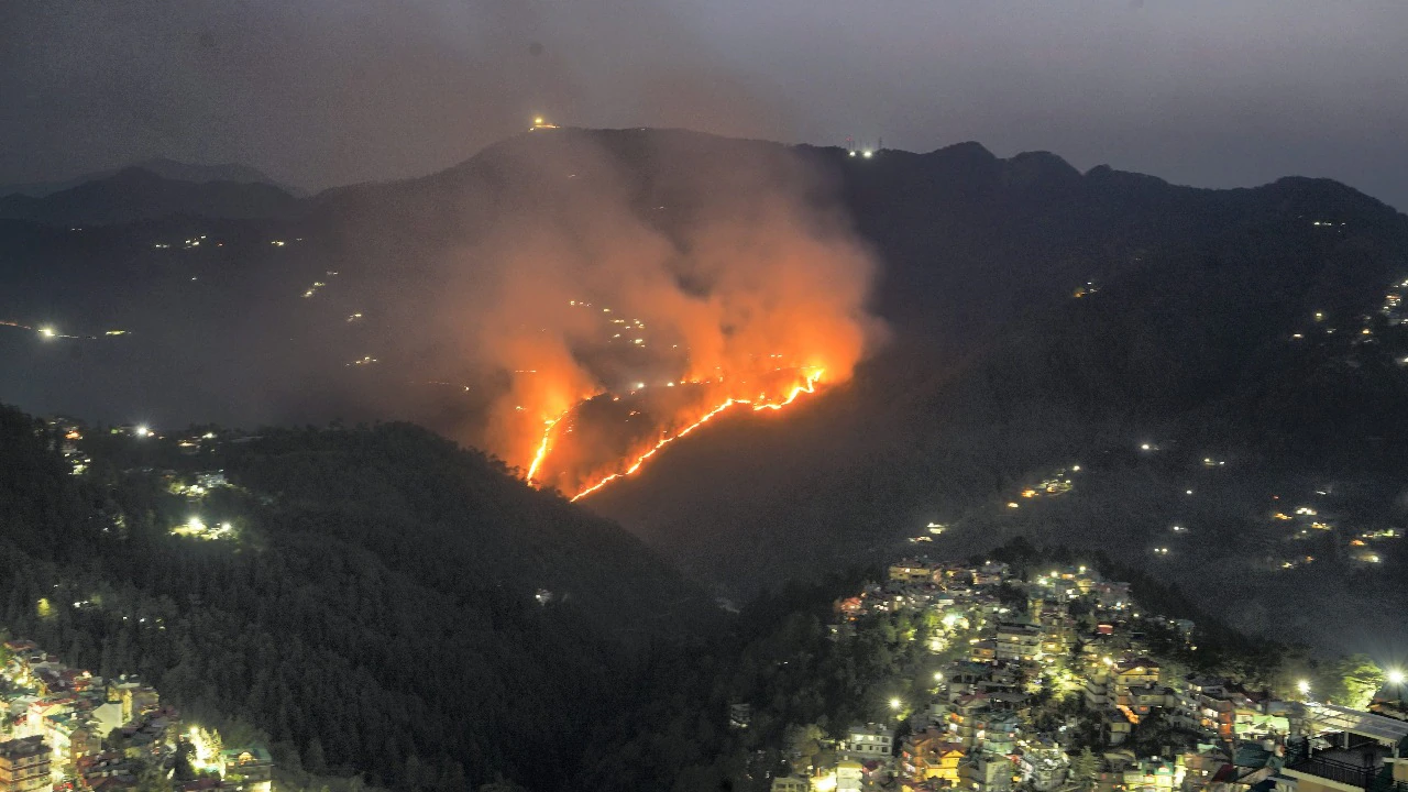 Firefighters battling a massive blaze near the government mental hospital in Boileauganj, Himachal Pradesh.