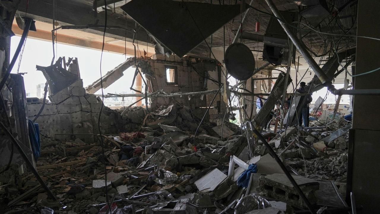 Damaged residential building in Gaza City following an Israeli airstrike targeting Hamas figures.