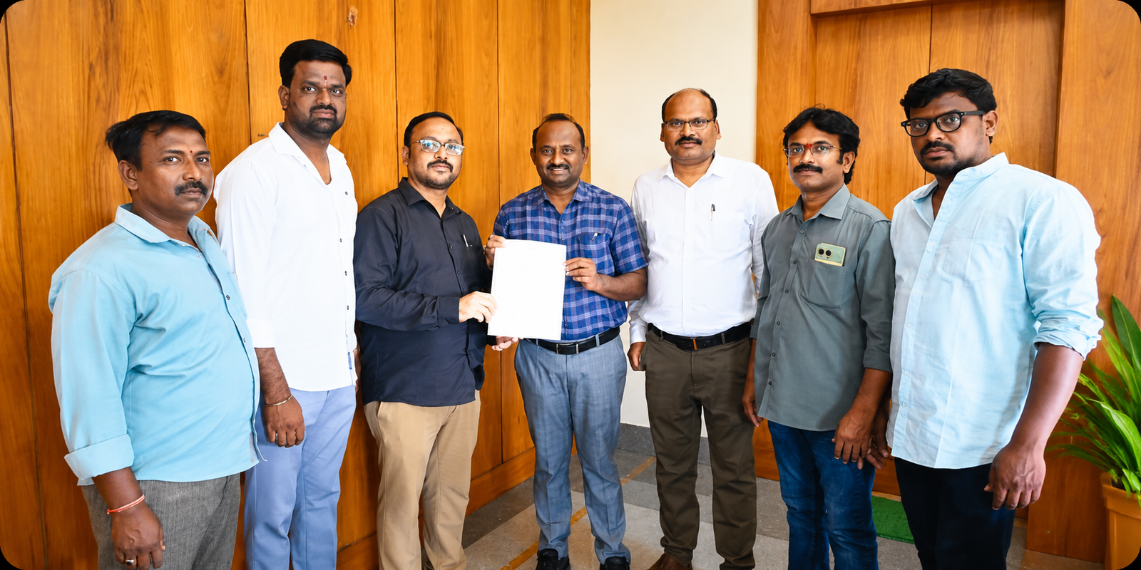 Rangareddy DEO handing over 50 percent fee concession orders for journalists' children studying in private schools.