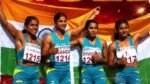 Indian women's asia relay team celebrates gold medal victory.