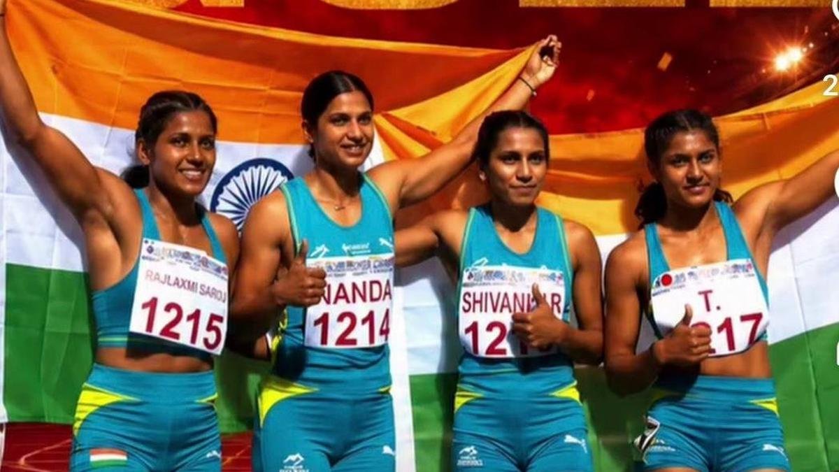 Indian women's asia relay team celebrates gold medal victory.