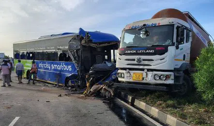 Private bus damaged after collision with cement mixer in Nalgonda.