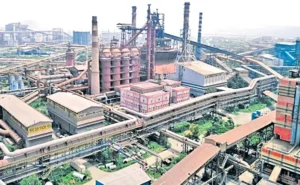 Steel Plant accident victims receiving Rs 25 lakh compensation cheques.