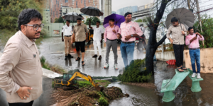 Serilingampally Zonal Commissioner inspecting waterlogging area near Election Commission office and drainage restoration works at Kajaguda Lake.