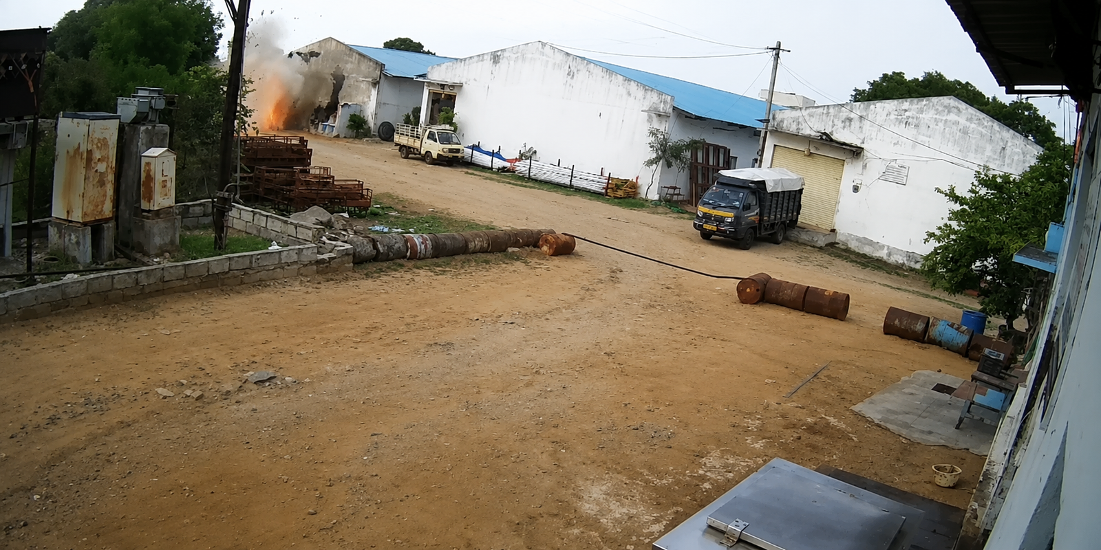 Forensic team inspecting blast site in Badangpet.