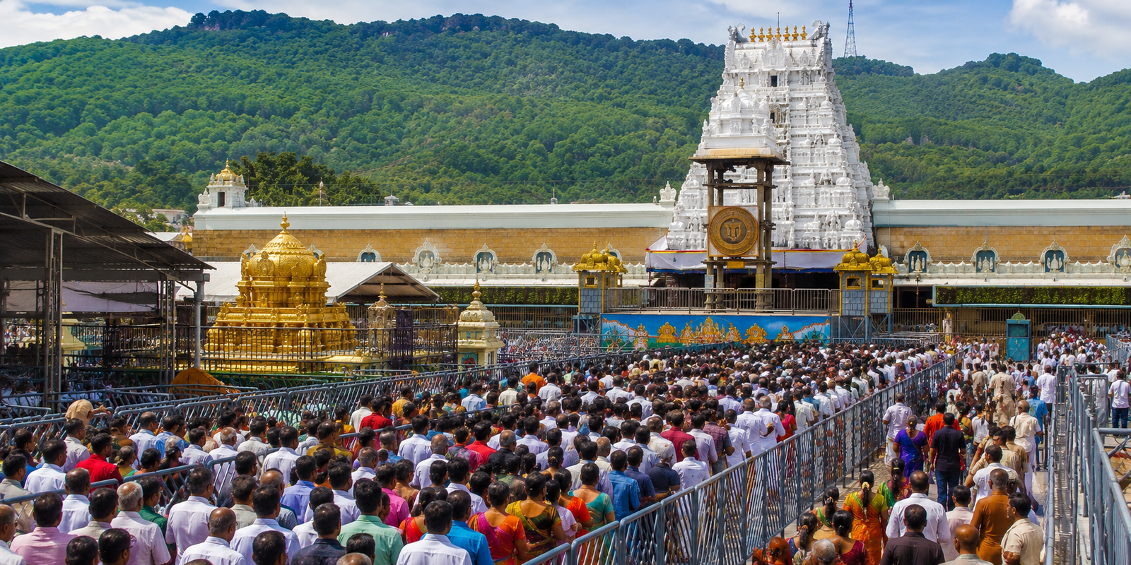 Devotees waiting in long queues at Tirumala temple.