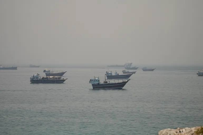 Oil tankers passing through the Strait of Hormuz.