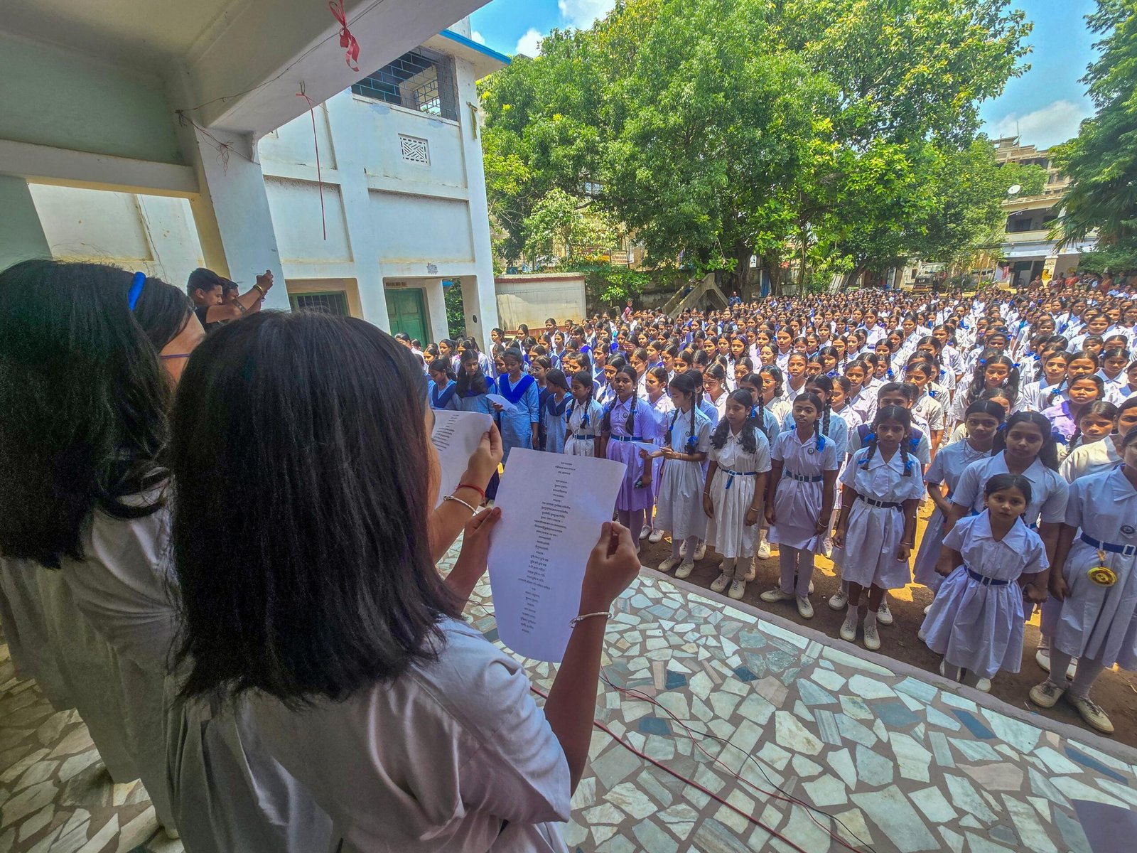 Officials during National Anthem at a government ceremony.