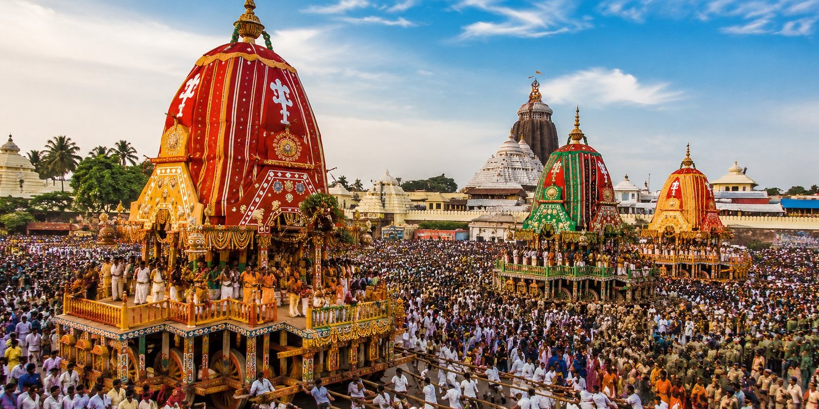 Devotees pulling Lord Jagannath's chariot during Puri Rath Yatra.