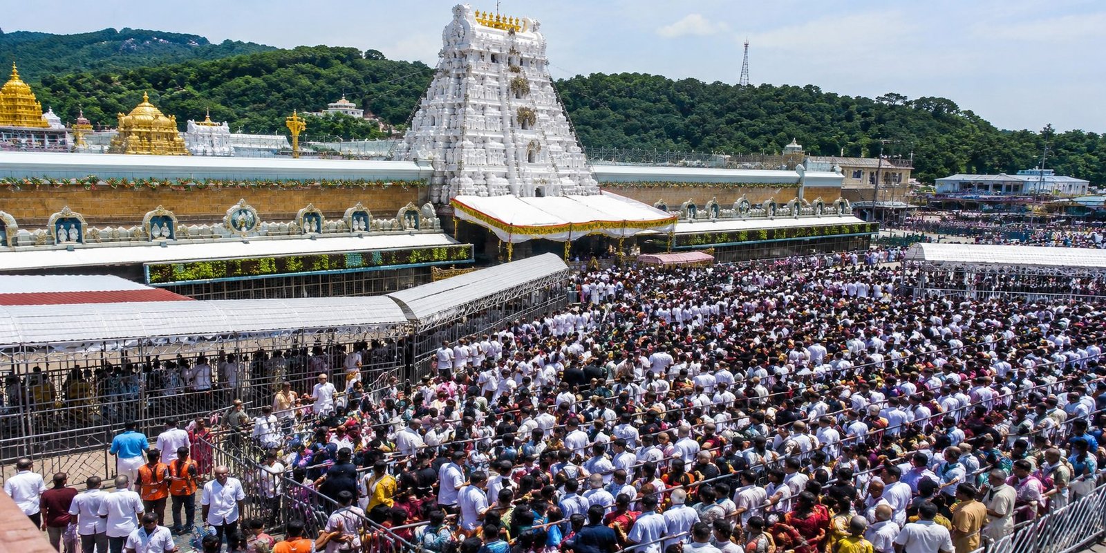 Devotees waiting in long queues for Tirumala Srivari Darshan.
