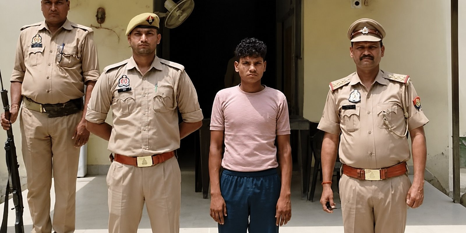 Police escort accused in Agra mother poisoning case.