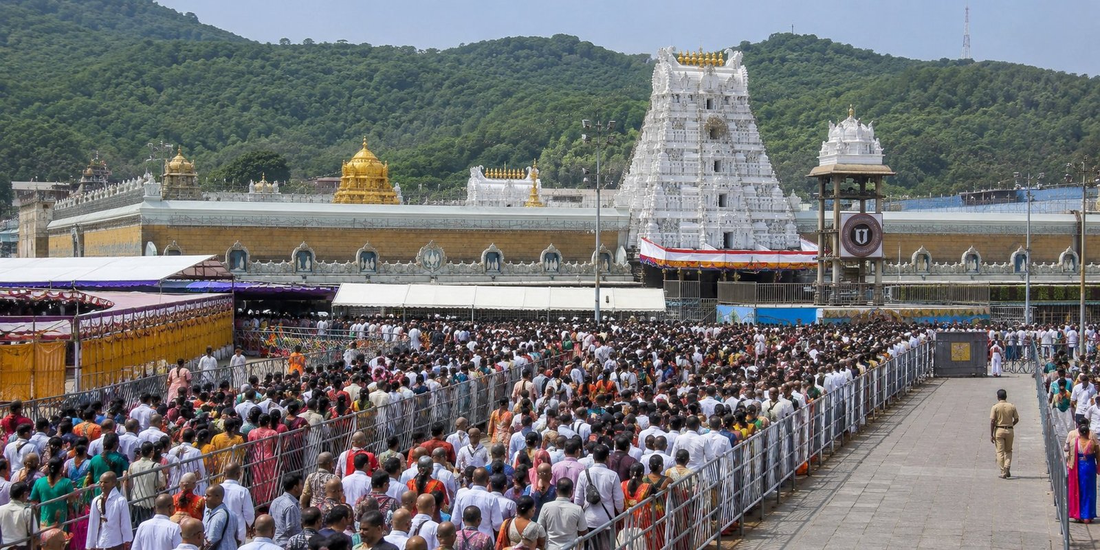 Devotees waiting in long queues for Tirumala Srivari Darshan.
