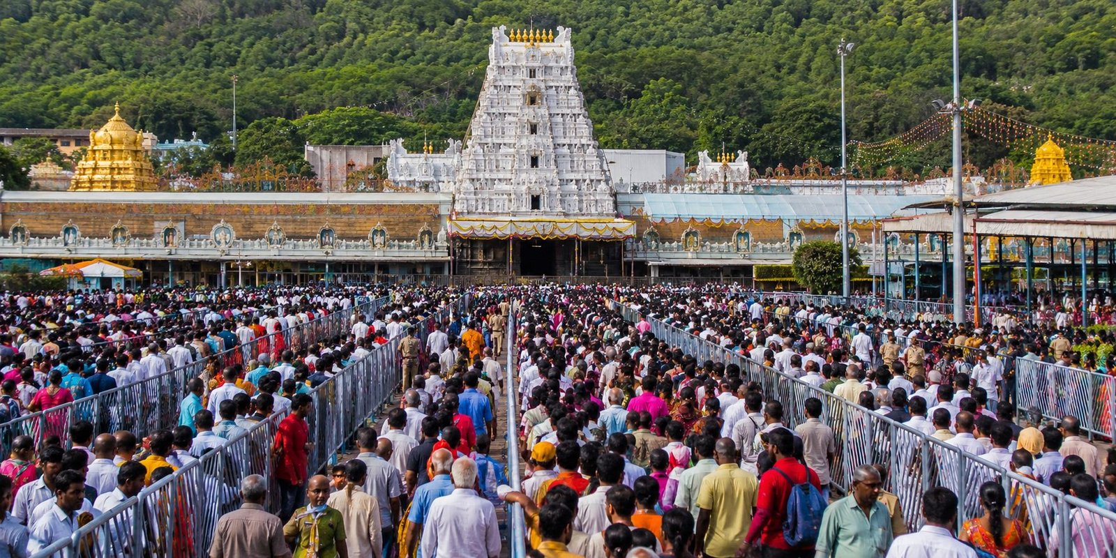 Devotees waiting in long queues at Tirumala for Srivari Darshan.
