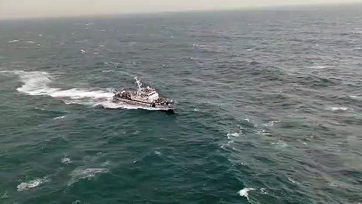 Coast Guard personnel searching for missing fisherman off Vizag coast.