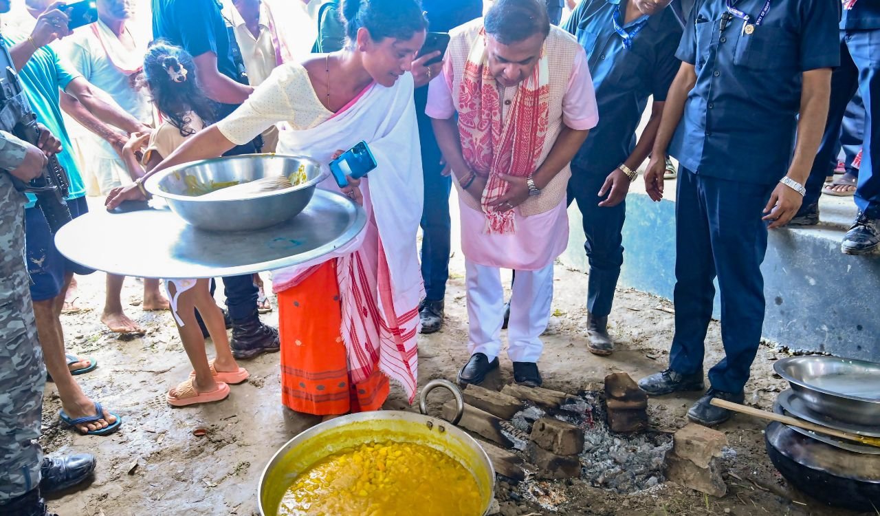 Assam flood relief rice distribution to affected families