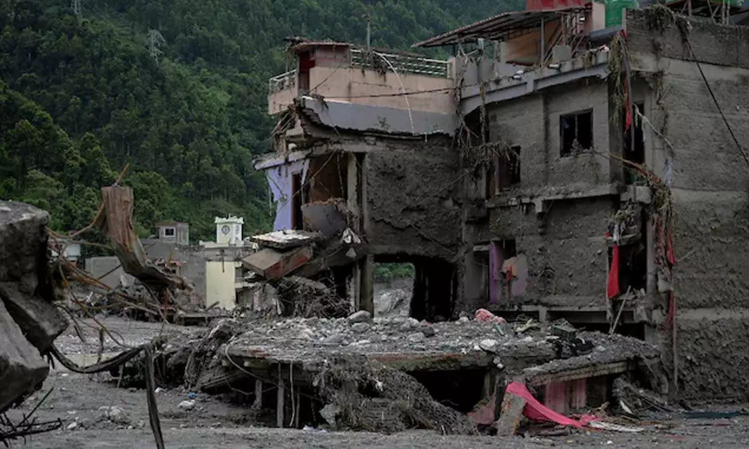 Rescue teams search flood-hit areas in Nepal.