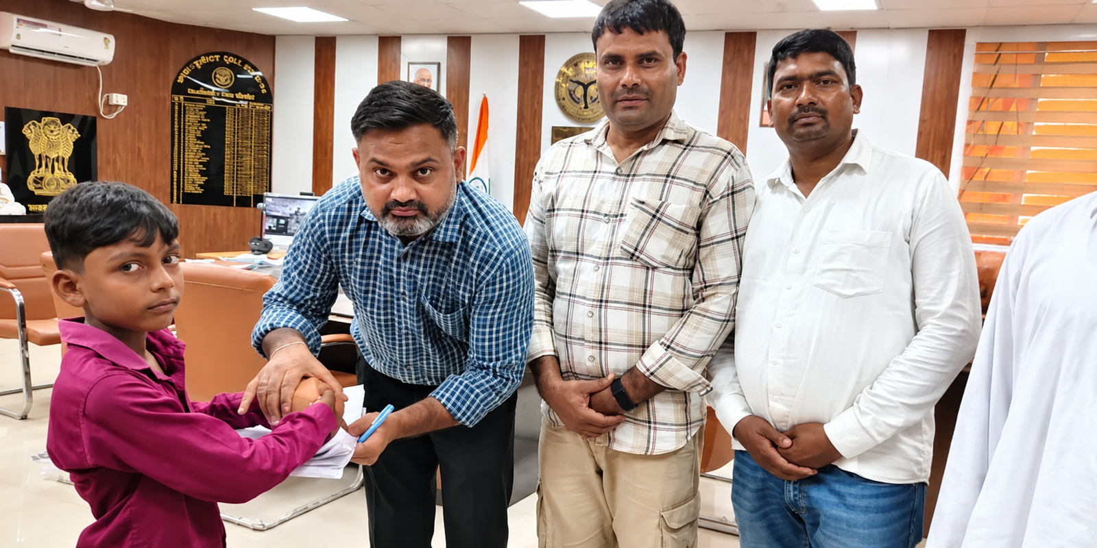 10-year-old Alfaz Sheikh donates piggy bank for Nepal flood victims.