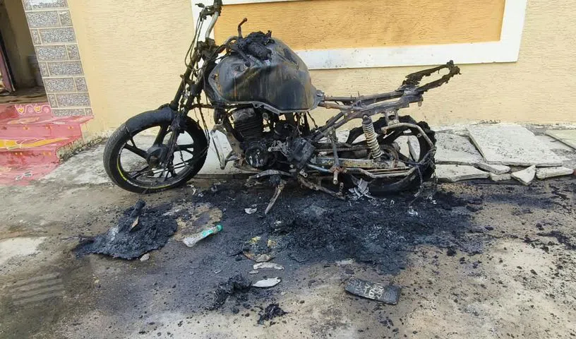 Burnt bike after fire incident in Sadasivapet colony