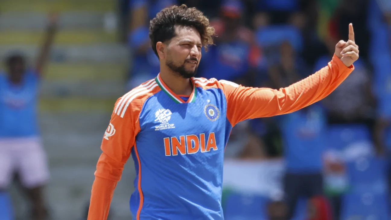 Kuldeep Yadav celebrates after taking four wickets for India.