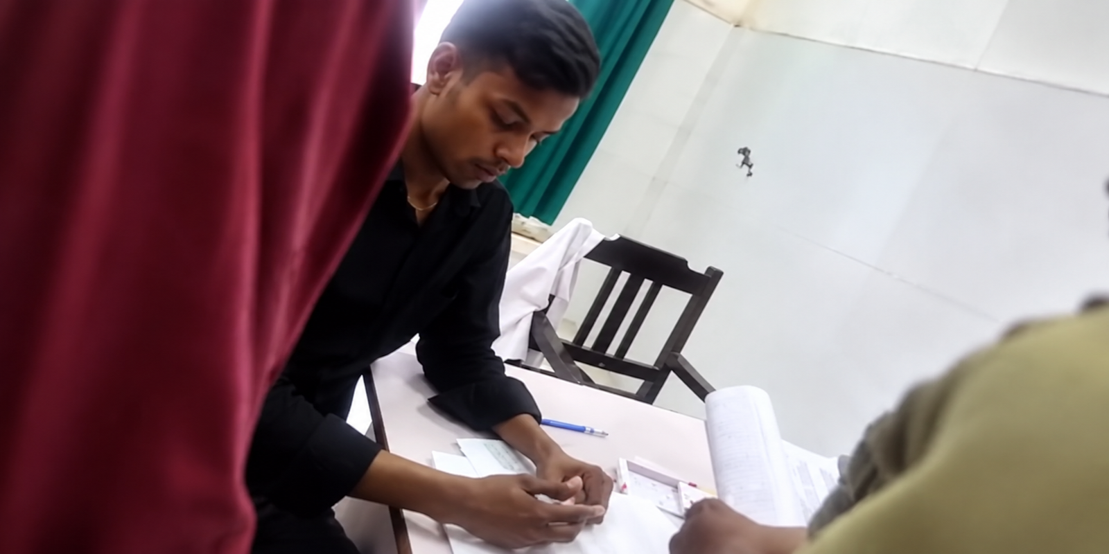 Kanpur government hospital driver allegedly treating patients in OPD.