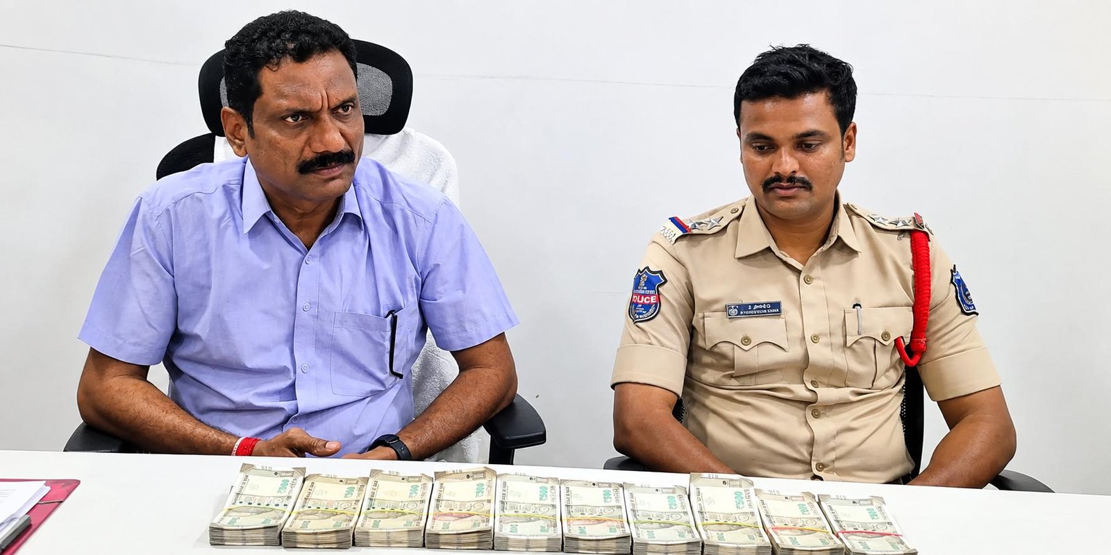 Telangana ACB officials conducting a raid in Keesara