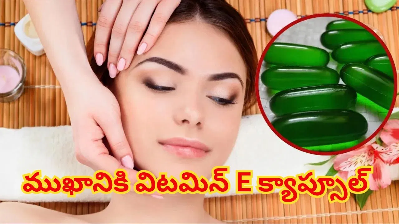 Woman applying Vitamin E skincare product on her face