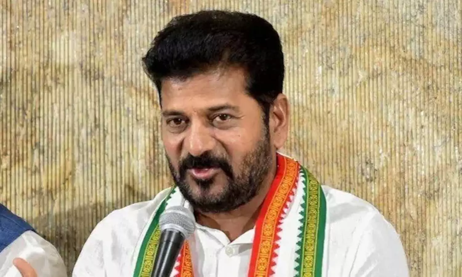 Revanth Reddy addresses Congress supporters during the Goa political campaign.