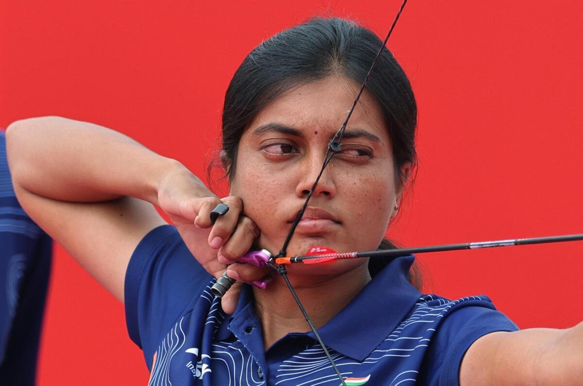 Chikitha Taniparthi celebrates after winning two archery gold medals.