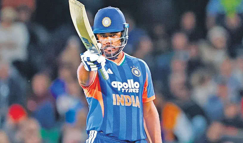 Sanju Samson and Naman Dhir celebrate India's T20 victory over New Zealand.