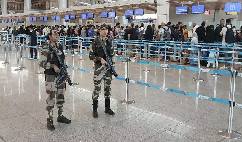 DRI officials inspect foreign currency seized at Shamshabad International Airport.