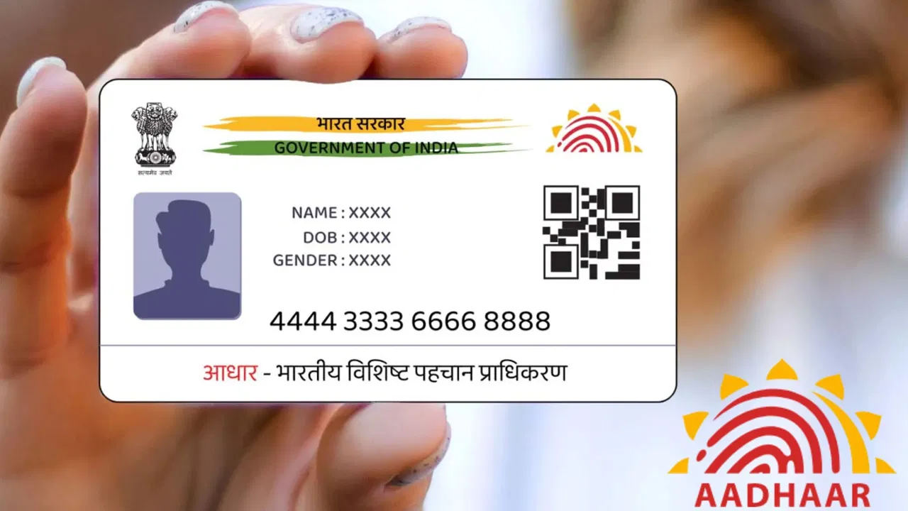 Woman updating surname in Aadhaar card after marriage