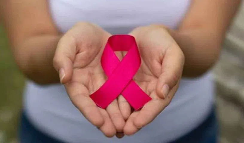 Doctor discussing breast cancer screening and mammography with a woman.