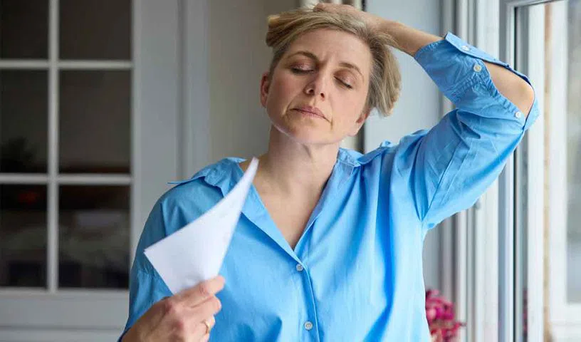 Woman discussing early menopause and heart health with doctor