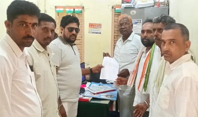 Villagers submitting a complaint at Torrur Tahsildar office.